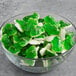 A bowl of green Vidal gummy frogs.