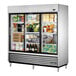 A True 3 section sliding glass door reach-in refrigerator.