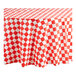 A red and white checkered Table Mate plastic table cover.