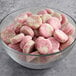 A bowl of Vidal pink and white gummy candy.