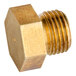 A brass hexagon nut without holes.