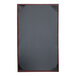A rectangular black menu cover with a grey board and red trim.