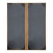 A grey board with black corners and a brown border.