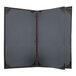 A brown rectangular menu cover with black corners.