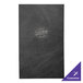 A black leather H. Risch, Inc. menu cover with white text on a table.