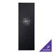 A black rectangular menu cover with silver custom text on it.