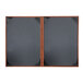 A brown menu cover with black trim.