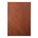 A close up of a customizable brown leather menu cover.