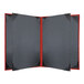 A black menu cover with red corners.