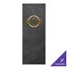 A black rectangular menu cover with a gold foil monogram on the front.