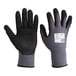 A pair of black and grey Armor Guys work gloves with black HCT Microfoam Nitrile palm coating.