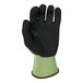 A close-up of a gray Armor Guys Kyorene Pro work glove with black and yellow accents.