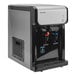 An Aquverse A2500-K black and silver countertop water dispenser with two water dispensers.