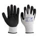 A pair of Armor Guys HDPE gloves with black and white HCT microfoam nitrile coating.