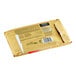A gold package with black text on a white background.