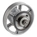 A metal clutch assembly wheel with gears.