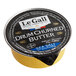 A yellow Le Gall container of churned butter.