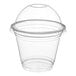 A clear PET plastic cup with a dome lid.