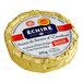 A round gold Echire butter packet with a white and red label.