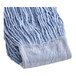 A close-up of a Lavex blue rayon mop head with a white headband.