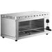 An Avantco stainless steel rectangular cheese melter with a handle.