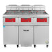 A large metal Vulcan floor fryer with red handles and white buttons.