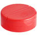 A red plastic spice lid with two flappers and 13 holes.