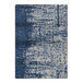 A close-up of a blue and white Joy Carpets High Tide area rug with a distressed look.
