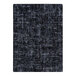 A close-up of a slate grey rectangular area rug with black and grey lines.