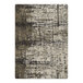 A Joy Carpets Coastal Canvas area rug with a beige and brown pattern.