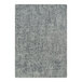 A gray rectangular area rug with a pattern that looks like black specks.