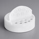 A white plastic 63/485 dual-flapper spice lid with induction liner and 7 holes.