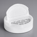 A white dual-flapper spice lid with 7 holes.