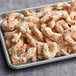 A tray of Mind Blown Plant-Based Vegan Coconut Shrimp on a table.