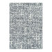 A close-up of a grey and white speckled surface on a Joy Carpets WorkSpace Cloudy area rug.
