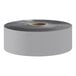 A roll of grey plastic with a white label.