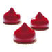 Three red Pavoni jasmine desserts made using a Pavoflex silicone mold.