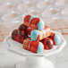 A stack of chocolate candies on a Pavoni Praline candy mold.