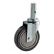 A close-up of a Lavex polyurethane wheel with a metal post.