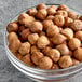 A bowl of Raw Oregon Filberts on a table.