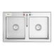 A Regency stainless steel double bowl drop-in sink with faucets.