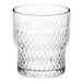 An Acopa Rivulet stackable rocks glass with a textured pattern.