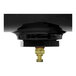 A close-up of a black rectangular object with a black and gold valve on top.