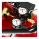 A red ProForce air compressor with gauges and pipes.