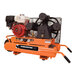An orange air compressor with a red and white engine.