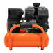 An orange and black Industrial Air Contractor portable air compressor.