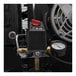 A close-up of the gauge on an Industrial Air stationary air compressor.