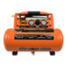 An orange Industrial Air Contractor air compressor with two gauges.