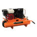 An orange and black Industrial Air Contractor wheelbarrow air compressor.