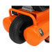 An orange air compressor with a black wheelbarrow tire.